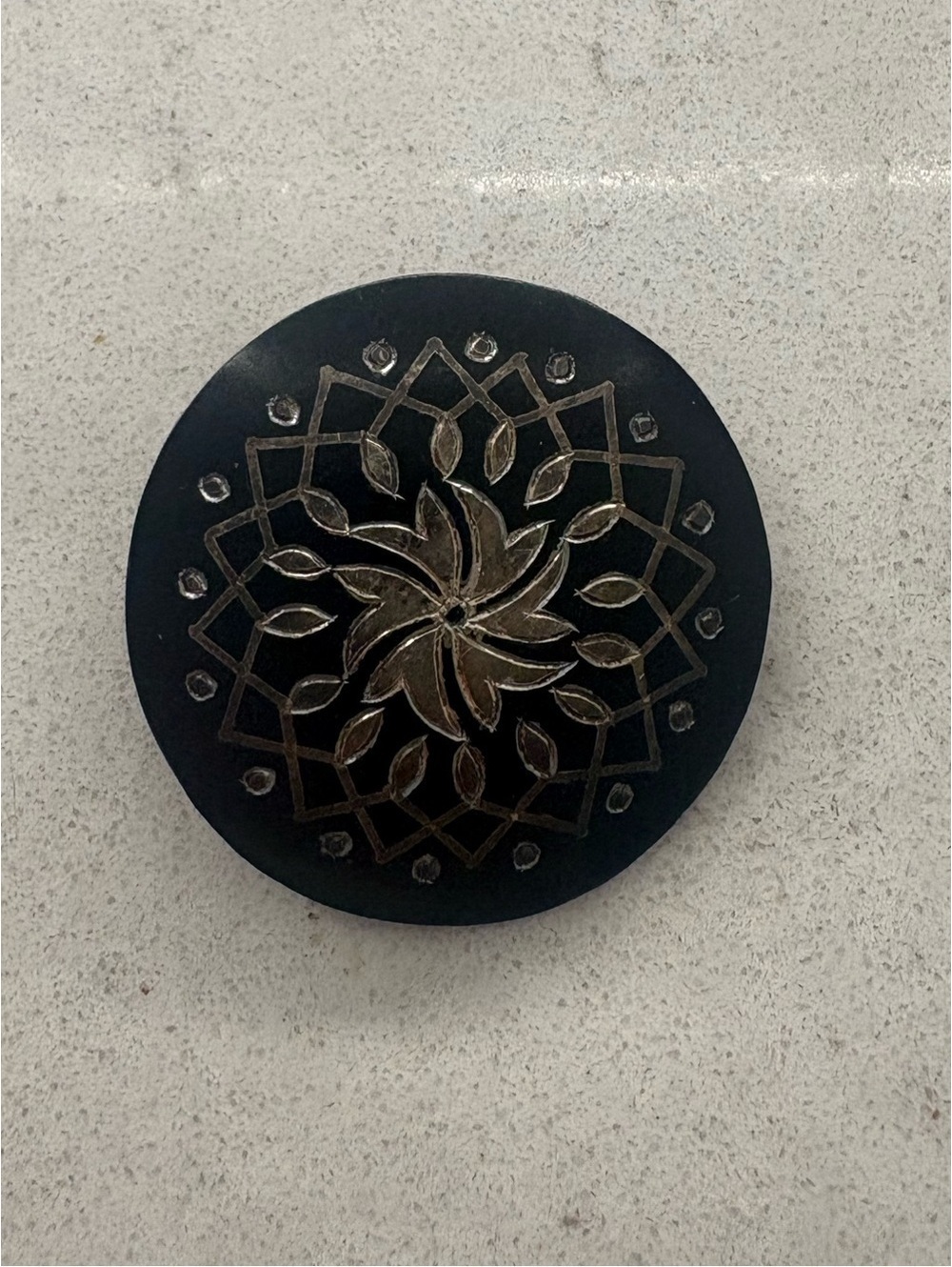 Vintage Black Decorative Pin Brooch with Metallic Floral Motif